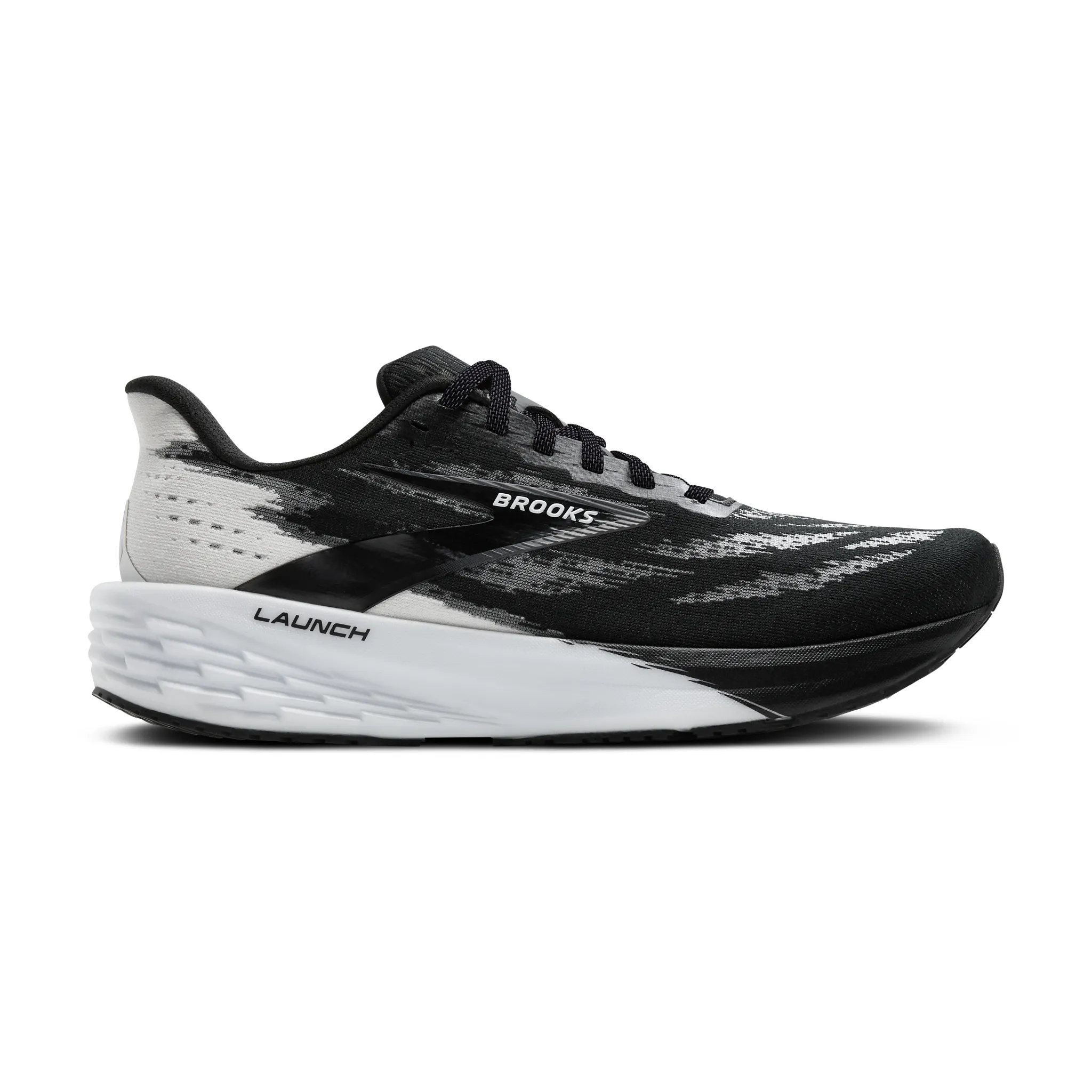 A black and white shoe that hgas the brooks logo in white on the right hand side